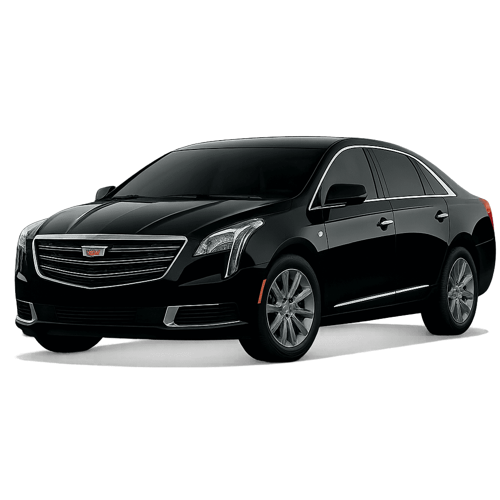 City-To-City Transfers 1 A sleek black Cadillac XTS luxury sedan shown from a front three-quarter view on a transparent background, part of the premium executive fleet for Gateway Limousine & Black Car Service.